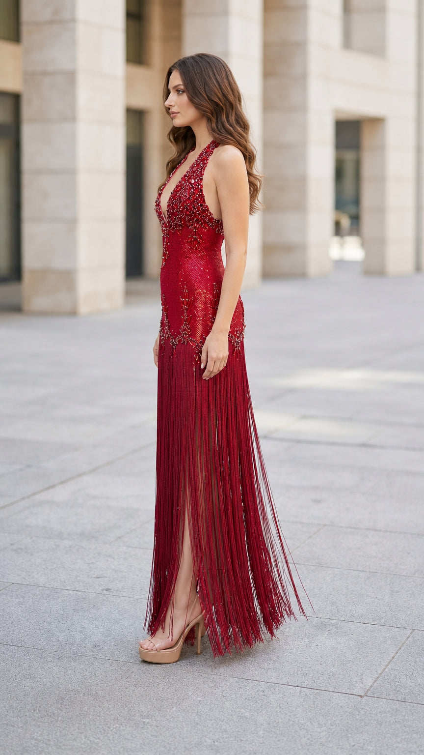 Side profile of model in Red sequin fringe maxi dress