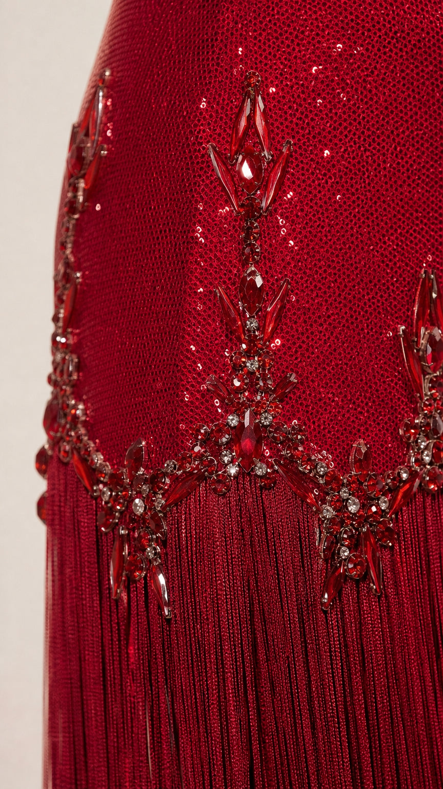 Close-up detail of rhinestone embroidery and fringe texture